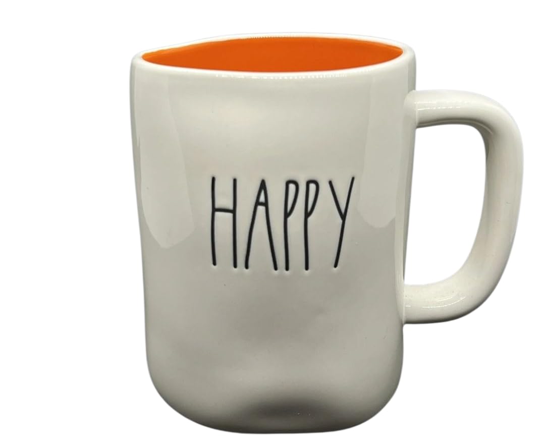 Rae Dunn Happy Halloween ceramic coffee mug. Double sided with orange interior