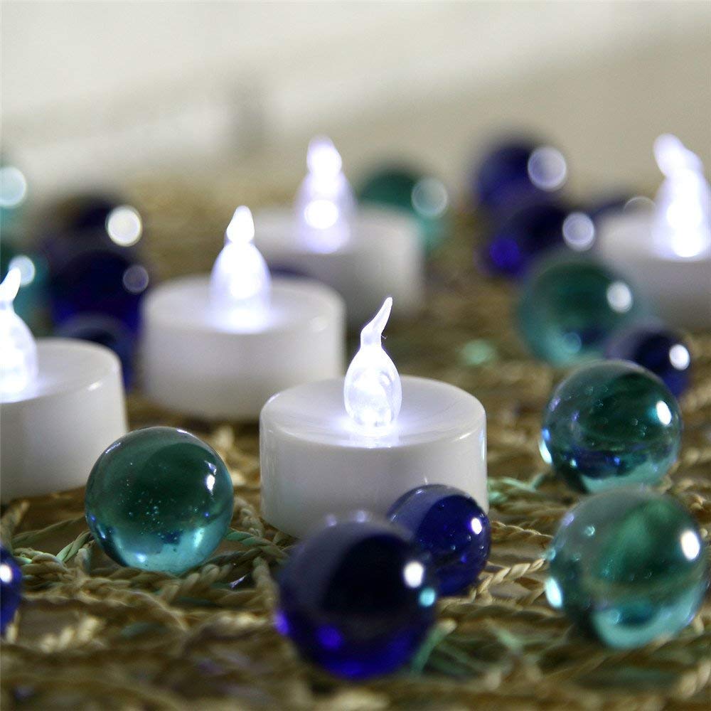 Tappovaly Battery Operated LED Tea Lights:50 Pack Flameless Votive Candles Lamp Realistic and Bright Flickering Long Lasting 200Hours for Wedding Holiday Party Home Decoration (Warm White)