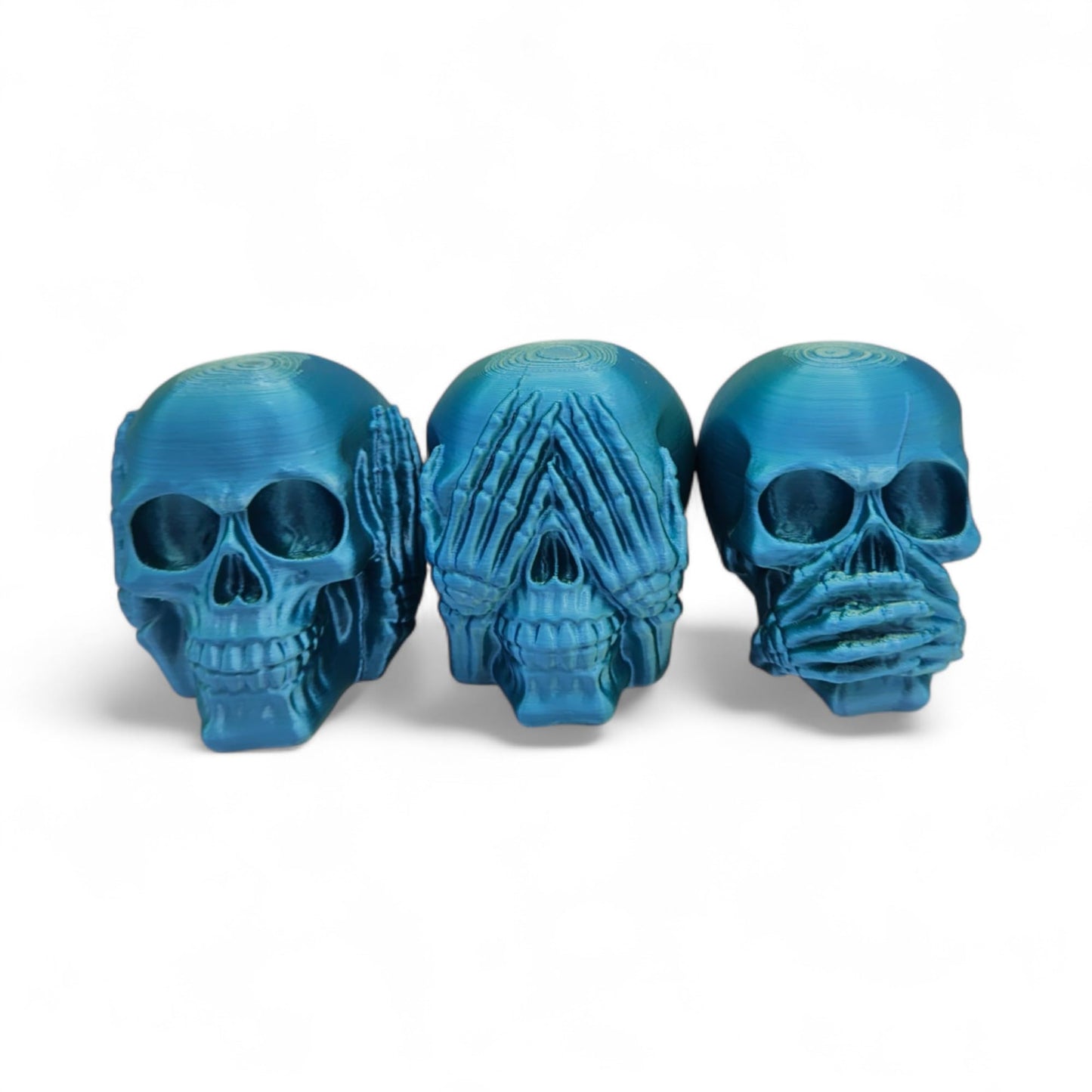 ZZ LIFE Set of 3 Skull Figurines – Hear No Evil, Speak No Evil, See No Evil – 4x3x2.5 Inch Halloween Decor – Gothic Skeleton Display for Shelf, Desk, or Altar – Horror Collectible (Blue/Green)