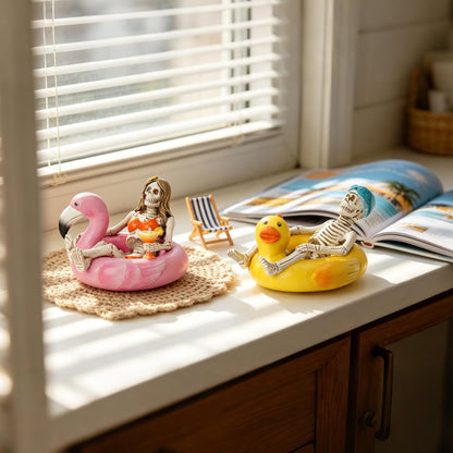 Summer Home Decor Halloween Skeleton-Statues - 2PC Summerween Collectible Figurines Couple on Yellow Duck & Pink Flamingo Floats Sulpture for Coastal Tropical Beach Halloween Decor Newman House Studio