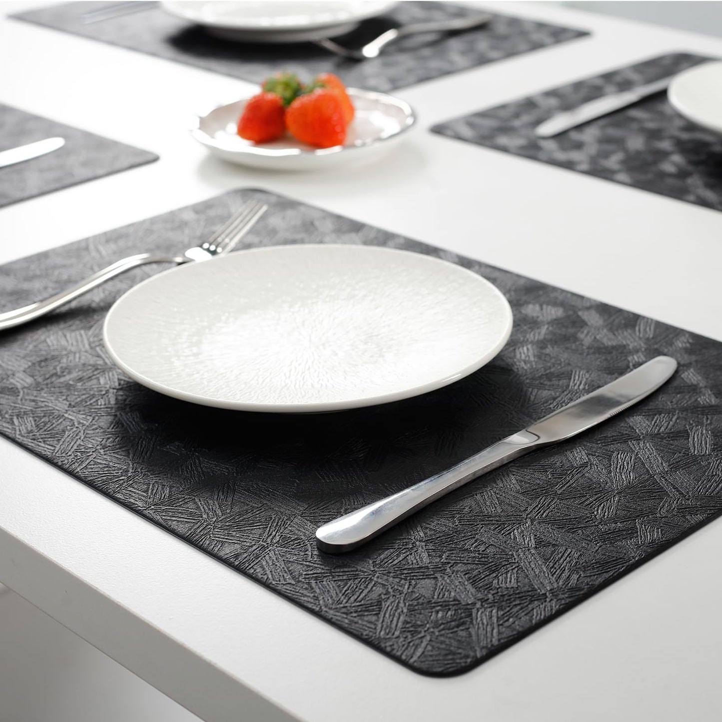 Bxzandya Vinyl Placemats Set of 4 Heat Resistant Easy Clean Non-Slip Place Mats for Dining Table. Faux Leather Waterproof Stain Resistant Wipeable Washable PU Table Mats(4, Black)