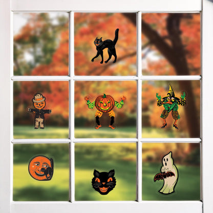 Beistle Vintage Halloween Window Clings, 28 Classic Icons on 4 Sheets, 12” x 17” Sheet, Cat Face, Moon, Ghost, Pumpkin Head Scarecrow, Scratch Cat, Goblin & Witch Characters