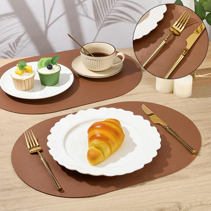 INTERWARM 10Pcs Waterproof PU Table Mats, 11.8x17.5Inch Oval Reversible Placemat Wipeable Washable Place Mats Faux Leather Placemats for Kitchen Dining Room Patio Indoor Outdoor, Peru