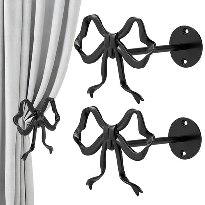 Tocemei 2 Pack Black Bow Curtain Holdbacks, Modern Matte Metal Curtain Holders for Wall,Rotatable Adjustable Angle,Elegant Bow Decor for Living Room Bedroom Home