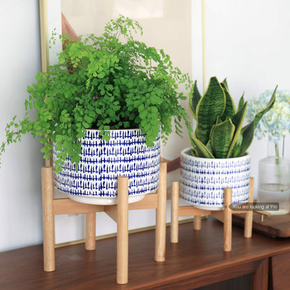 LA JOLIE MUSE Blue Planter with Stand - 7.3 Inch Retro Round Decorative Flower Pot Indoor with Wood Planter Holder, Blue and White, Home Decor Gift