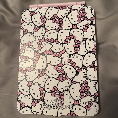 Impressions Vanity Hello Kitty Touch Pad Mini Tri-Tone Makeup Mirror with Printed Flip Cover and LED Strip, Travel Vanity Mirror with Touch Sensor Switch and USB Extension (White/Pink)