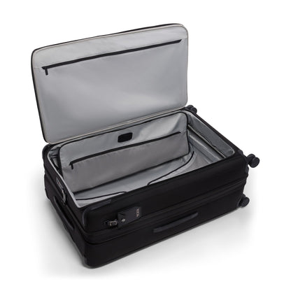 TUMI - Alpha XX-Large Dual Access Expandable 4-Wheeled Checked Luggage - Zipper Expansion - Durable Ballistic Nylon - Extra Large Capacity Suitcase with TSA Lock - Black