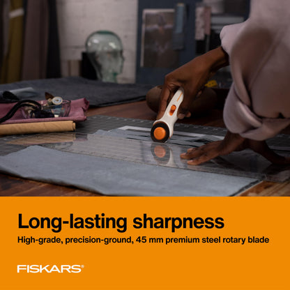 Fiskars 45mm Rotary Cutter for Fabric, Premium Steel Stick Fabric Cutter Cuts Through Multiple Layers, Right and Left Handed, Easy and Safe Blade Change, Arts and Crafts, Sewing and Quilting Tools