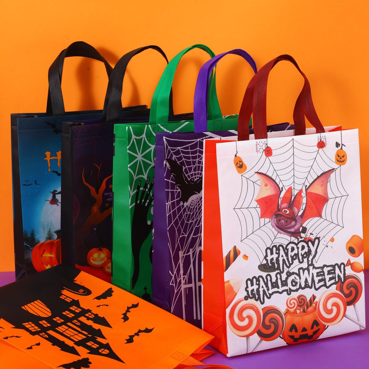 Sanwuta 24 Pcs Halloween Tote Gift Bags 14.9 x 11.8 Large Trick or Treat Reusable Non Woven Candy Treat Goodies Bags for Halloween Party Supplies