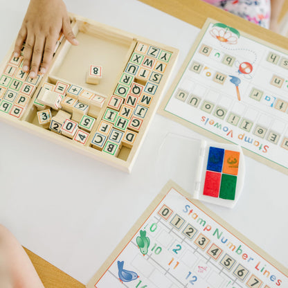 Melissa & Doug Deluxe Letters and Numbers Wooden Stamp Set ABCs 123s With Activity Book, 4-Color Stamp Pad - FSC Certified
