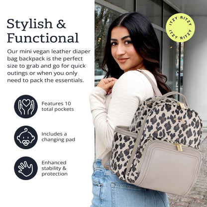 Itzy Ritzy Mini Diaper Bag Backpack – Chic, Compact Mini Plus Backpack with Changing Pad, 10 Pockets (6 Internal, 4 External), Grab-Top Handle & Rubber Feet (Leopard)