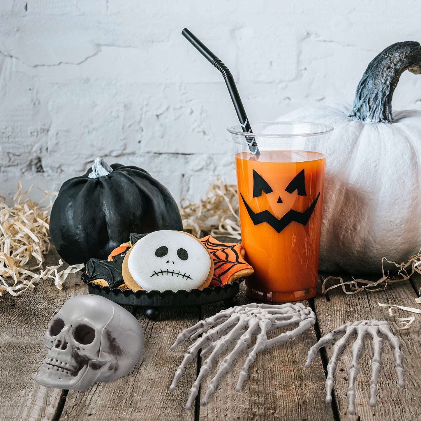 8 Pieces Halloween Decoration Set Includes 4 Halloween Mini Skulls Realistic Looking Skulls and 4 Skeleton Hands Plastic Fake Human Hands for Decoration