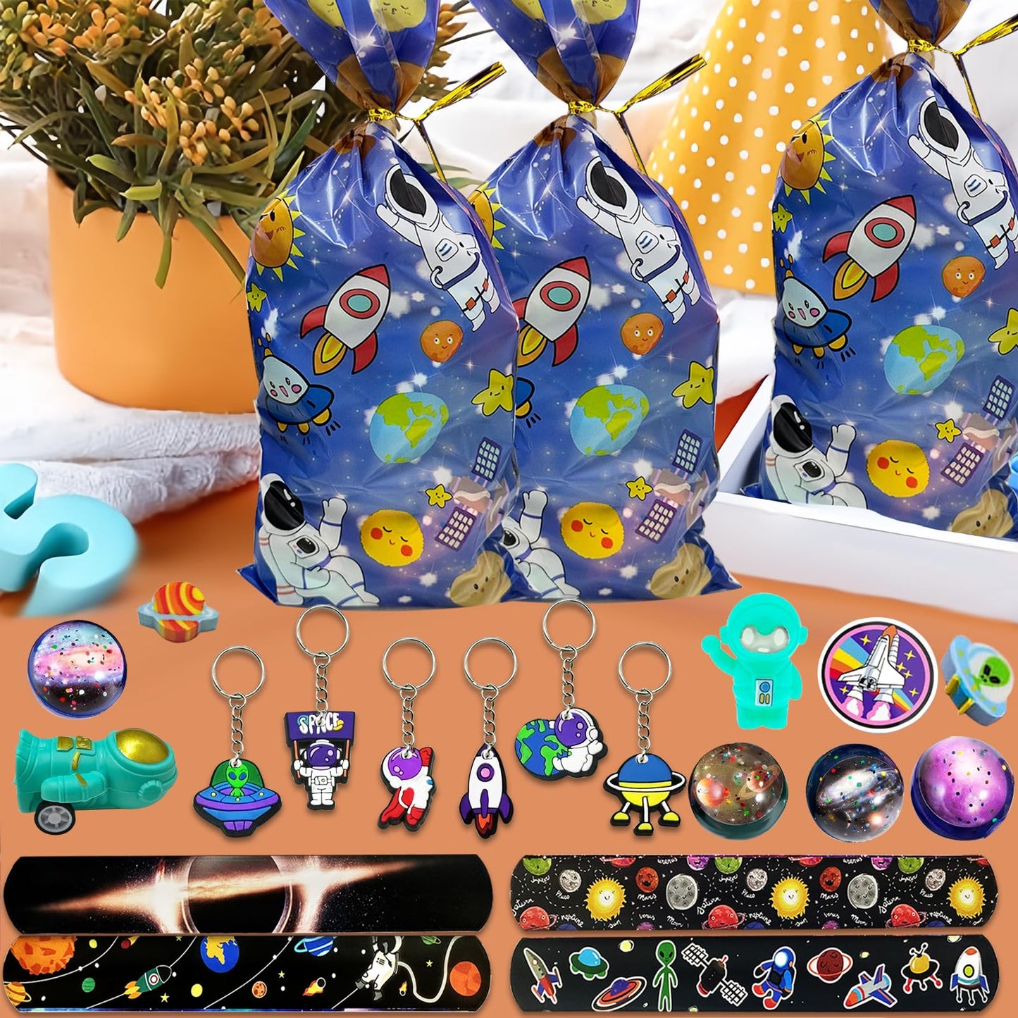 QZYCMHOO 152PCS Space Party Favors Set, Outer Space Birthday Decorations Including Slap Bracelets, Keychains, Gift Bags, DIY Stickers, Drinking Straws, Alien Birthday Supplies