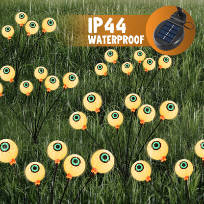 JOYIN Halloween Decorations Outdoor Solar Scary Eyeball Lights, 8 Pcs 48LEDs Warm Pathway Yard Stakes, Waterproof Firefly Lights for Halloween Graveyard Yard Garden Patio Walkway Party