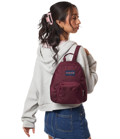 JanSport Half Pint Mini Backpack, 10.2 L - Durable Mini Bag Purse with Adjustable Shoulder Straps, Single Main Compartment, Zippered Stash Pocket, Cherry Lacquer